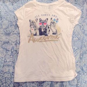 I’m selling a white shirt with dogs on the front